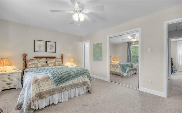 8 Riverview Ct, Suffolk, VA 23434 - carpeted bedroom featuring a closet, baseboards, and a ceiling fan