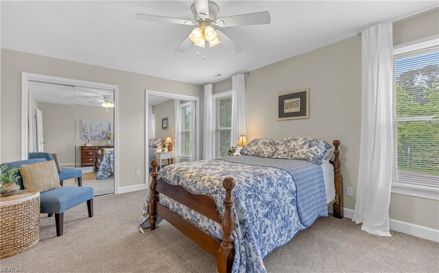 8 Riverview Ct, Suffolk, VA 23434 - bedroom featuring carpet floors, a closet, baseboards, and ceiling fan
