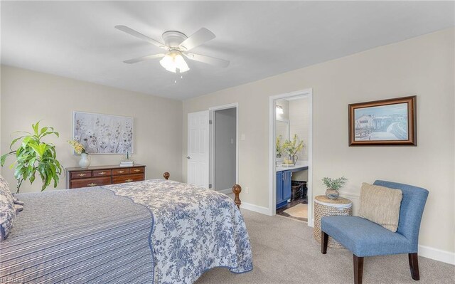 8 Riverview Ct, Suffolk, VA 23434 - bedroom with light carpet, baseboards, a ceiling fan, and ensuite bathroom