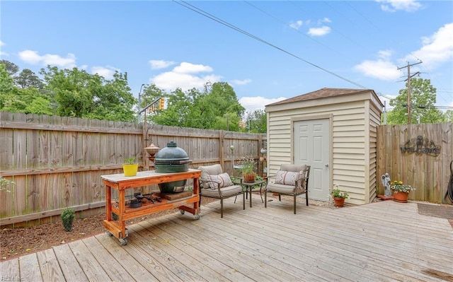 8 Riverview Ct, Suffolk, VA 23434 - wooden deck featuring an outdoor structure, a storage unit, a fenced backyard, and a grill