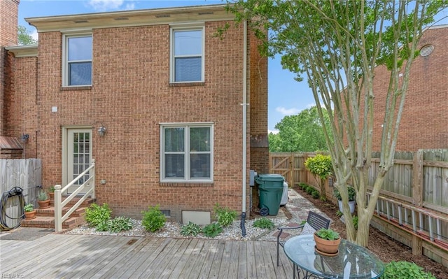 8 Riverview Ct, Suffolk, VA 23434 - rear view of property featuring entry steps, a wooden deck, crawl space, brick siding, and a fenced backyard