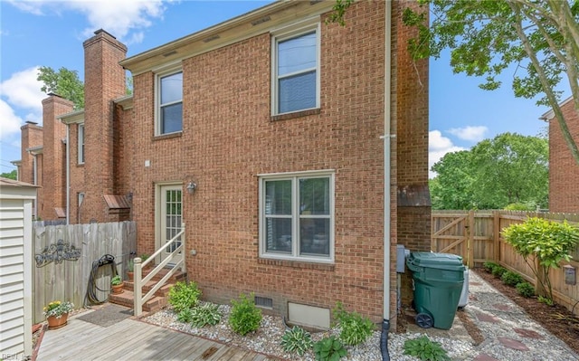 8 Riverview Ct, Suffolk, VA 23434 - rear view of property with entry steps, brick siding, and a fenced backyard