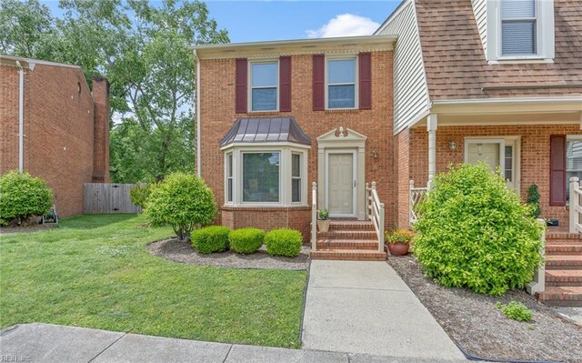 8 Riverview Ct, Suffolk, VA 23434 - view of property with brick siding and roof with shingles