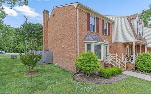 8 Riverview Ct, Suffolk, VA 23434 - view of side of home with brick siding and a chimney