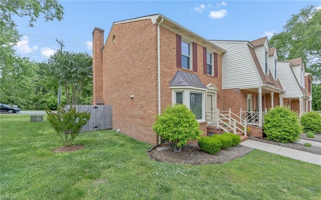 8 Riverview Ct, Suffolk, VA 23434 - view of property exterior with brick siding and a chimney