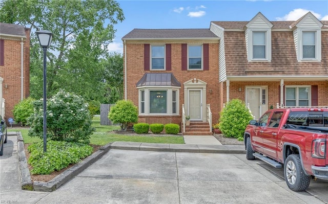 8 Riverview Ct, Suffolk, VA 23434 - view of property featuring brick siding and roof with shingles