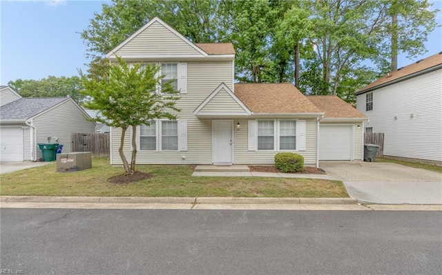 187 N Hunt Club Run, Newport News, VA 23608 - traditional-style house with concrete driveway, an attached garage, and roof with shingles