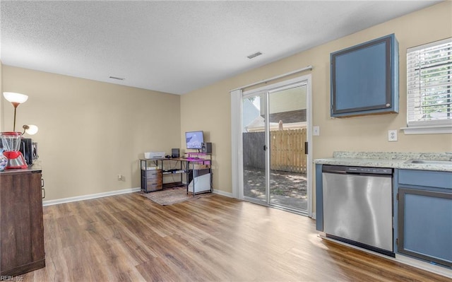187 N Hunt Club Run, Newport News, VA 23608 - bar featuring stainless steel dishwasher, wood finished floors, baseboards, a textured ceiling, and a sink