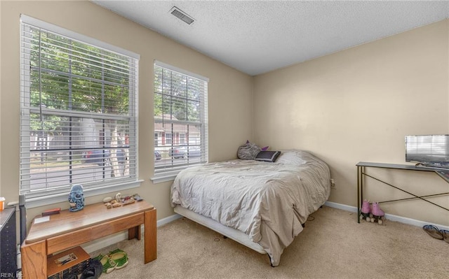 187 N Hunt Club Run, Newport News, VA 23608 - bedroom featuring light carpet, baseboards, and a textured ceiling
