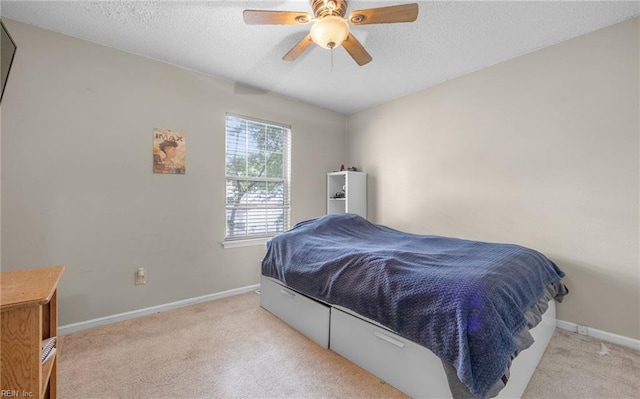 187 N Hunt Club Run, Newport News, VA 23608 - bedroom with light colored carpet, baseboards, a textured ceiling, and a ceiling fan