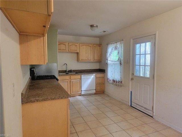 312 Shawen Dr, Hampton, VA 23669 - kitchen with white dishwasher, light brown cabinetry, a sink, light tile patterned floors, and range with gas cooktop