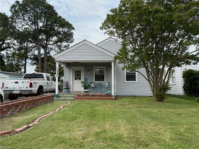 1132 W Ocean View Ave, Norfolk, VA 23503 - view of front of home with a porch and a front lawn