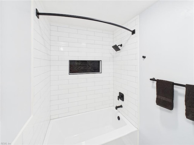 bathroom with shower / bath combination