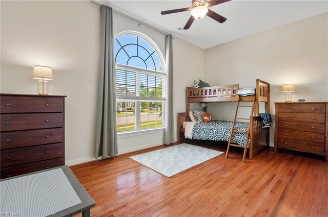 816 Dawson Cir, Chesapeake, VA 23322 - bedroom with light wood finished floors, multiple windows, and baseboards