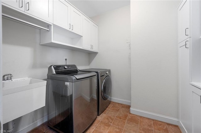 816 Dawson Cir, Chesapeake, VA 23322 - laundry room featuring washing machine and dryer, cabinet space, and baseboards