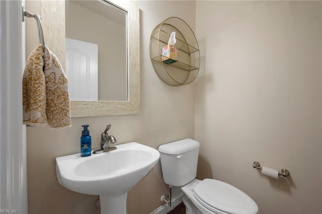 816 Dawson Cir, Chesapeake, VA 23322 - bathroom with a sink, toilet, and baseboards