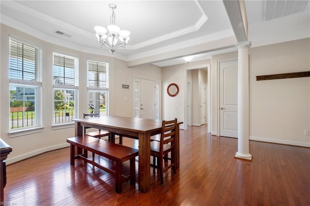816 Dawson Cir, Chesapeake, VA 23322 - dining space featuring decorative columns, a chandelier, hardwood / wood-style floors, baseboards, and ornamental molding