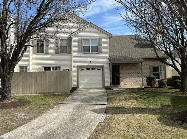 5049 Heathglen Cir, Virginia Beach, VA 23456 - traditional home featuring concrete driveway, a garage, a shingled roof, and brick siding