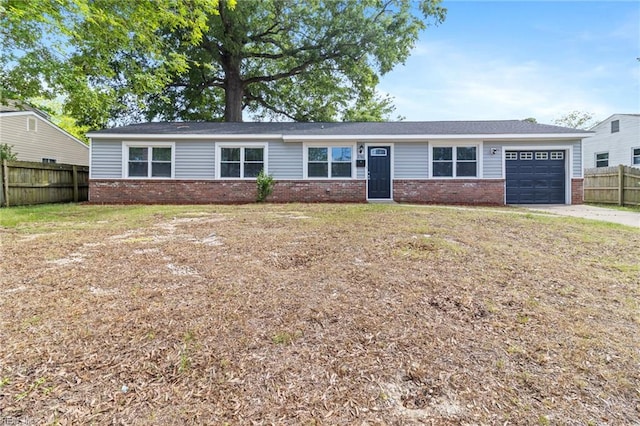 view of front facade featuring brick siding, a garage, and concrete driveway