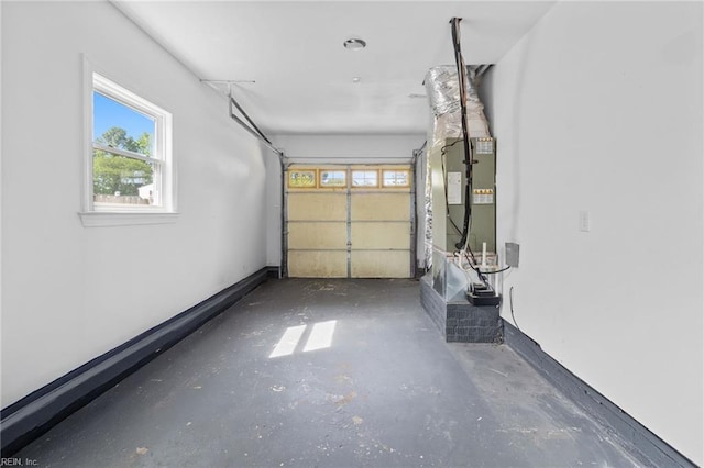 garage featuring heating unit