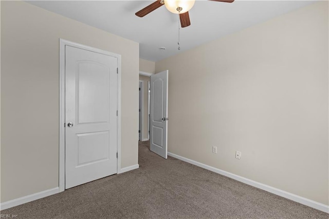 515 Battery Ave, Suffolk, VA 23434 - unfurnished bedroom with carpet, baseboards, and ceiling fan