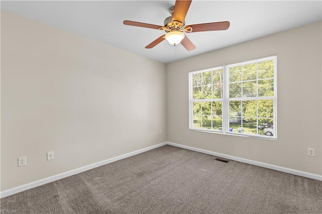 515 Battery Ave, Suffolk, VA 23434 - spare room with baseboards, carpet, and ceiling fan
