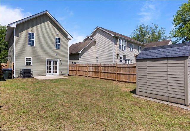 515 Battery Ave, Suffolk, VA 23434 - back of house with french doors, an outbuilding, a storage shed, a patio, and central AC
