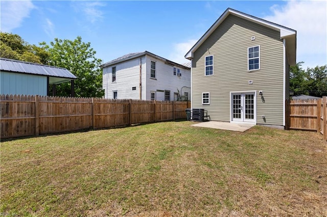 515 Battery Ave, Suffolk, VA 23434 - rear view of property with french doors and a patio area