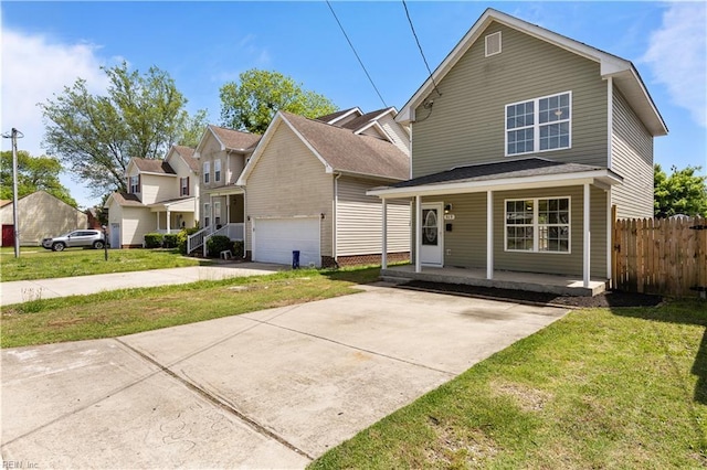 515 Battery Ave, Suffolk, VA 23434 - traditional home with concrete driveway, a porch, and a garage