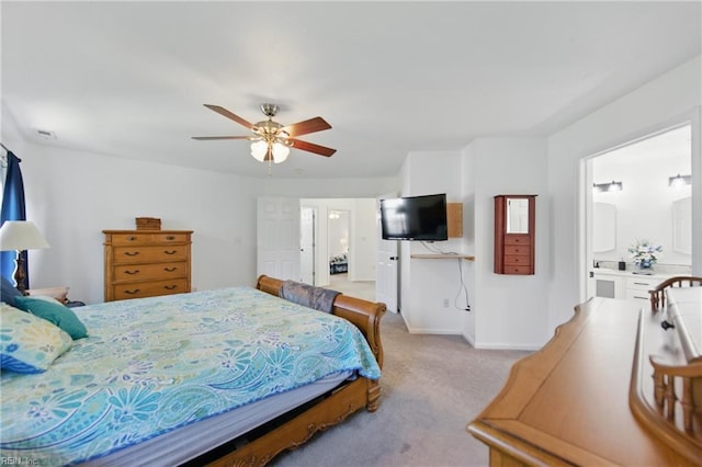 bedroom featuring light carpet, baseboards, and ceiling fan