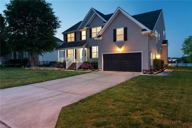 view of front facade with driveway and an attached garage