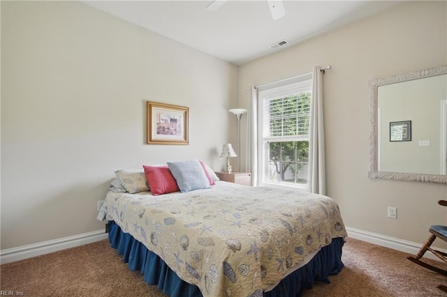bedroom featuring carpet flooring, baseboards, and ceiling fan