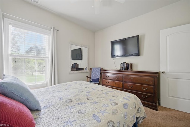 bedroom featuring carpet floors and a ceiling fan