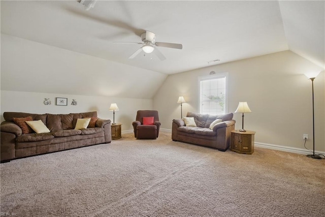 living room featuring lofted ceiling, ceiling fan, carpet flooring, and baseboards
