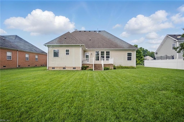 back of property featuring crawl space and roof with shingles