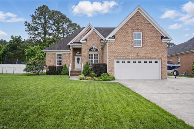 traditional-style house with a garage, concrete driveway, and brick siding