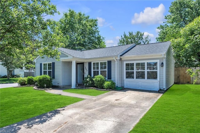 single story home with roof with shingles and driveway