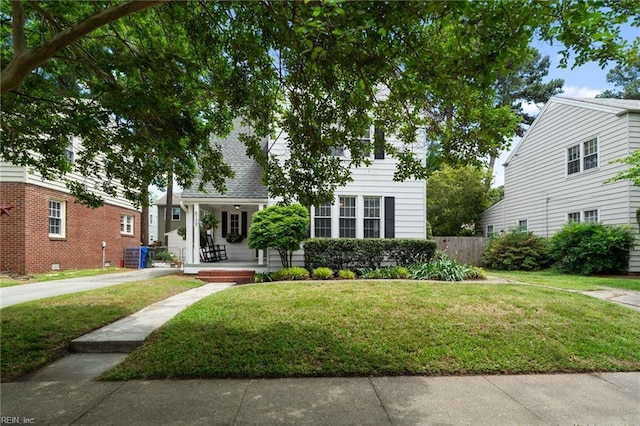 view of property hidden behind natural elements featuring driveway
