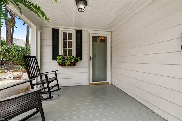 entrance to property with covered porch