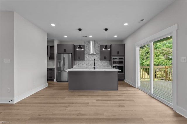 439 Cooper St, Hampton, VA 23669 - kitchen featuring stainless steel appliances, wall chimney exhaust hood, baseboards, light countertops, and recessed lighting