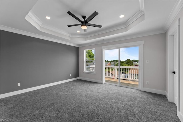 439 Cooper St, Hampton, VA 23669 - spare room featuring a tray ceiling, carpet floors, ornamental molding, ceiling fan, and baseboards