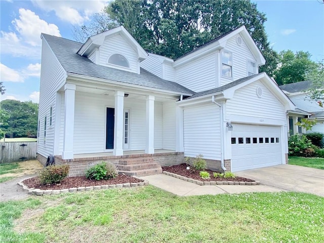 greek revival inspired property featuring covered porch, concrete driveway, a garage, and a shingled roof