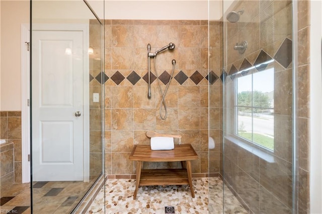 bathroom with tiled shower