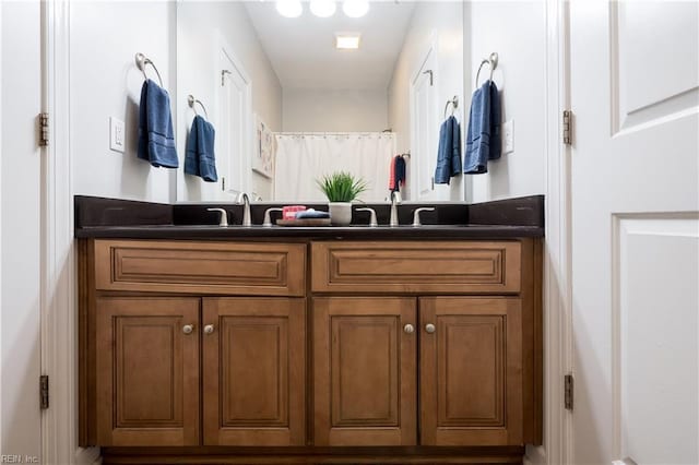 full bath featuring double vanity