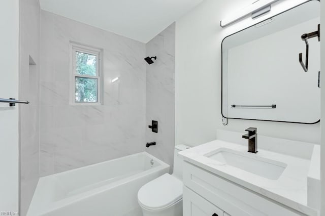 full bath featuring toilet, washtub / shower combination, and vanity