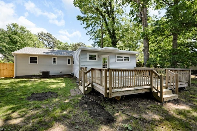 back of house with cooling unit, a wooden deck, crawl space, and roof with shingles