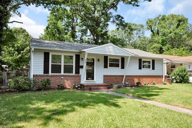 view of front of property featuring brick siding and a shingled roof
