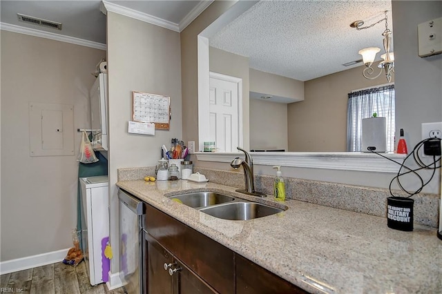 5120 Bardith Cir, Virginia Beach, VA 23455 - kitchen featuring a sink, wood finished floors, baseboards, dark brown cabinetry, and crown molding