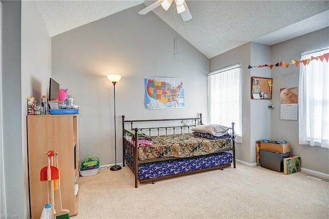 5120 Bardith Cir, Virginia Beach, VA 23455 - carpeted bedroom with multiple windows, baseboards, high vaulted ceiling, a ceiling fan, and a textured ceiling