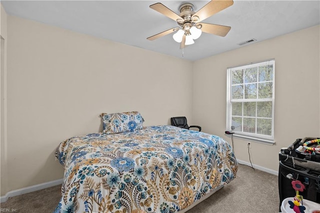 1309 W 25th St, Norfolk, VA 23508 - carpeted bedroom featuring baseboards and a ceiling fan